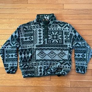 Eastern Mountain Sports 3 button pullover fleece. Green southwest pattern.